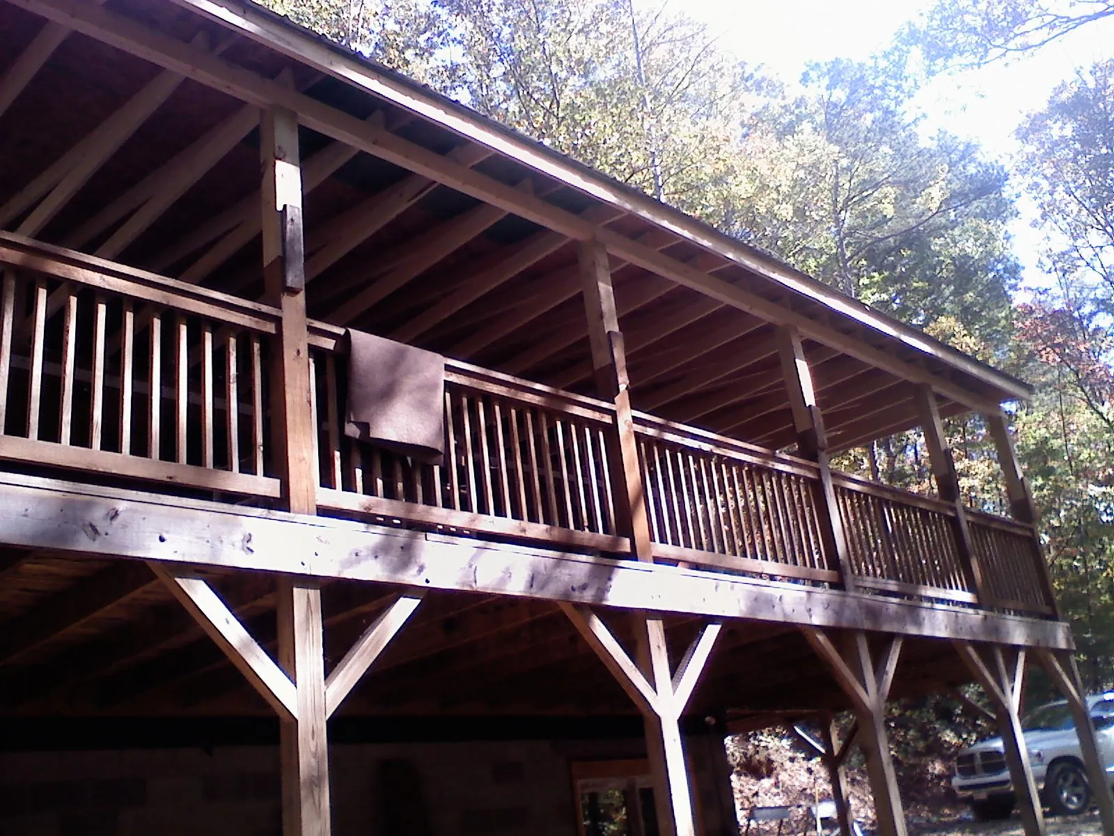 Timber framing under a new elevated porch and deck — Roof Leak Repair in Bozrah by Roofing Brothers